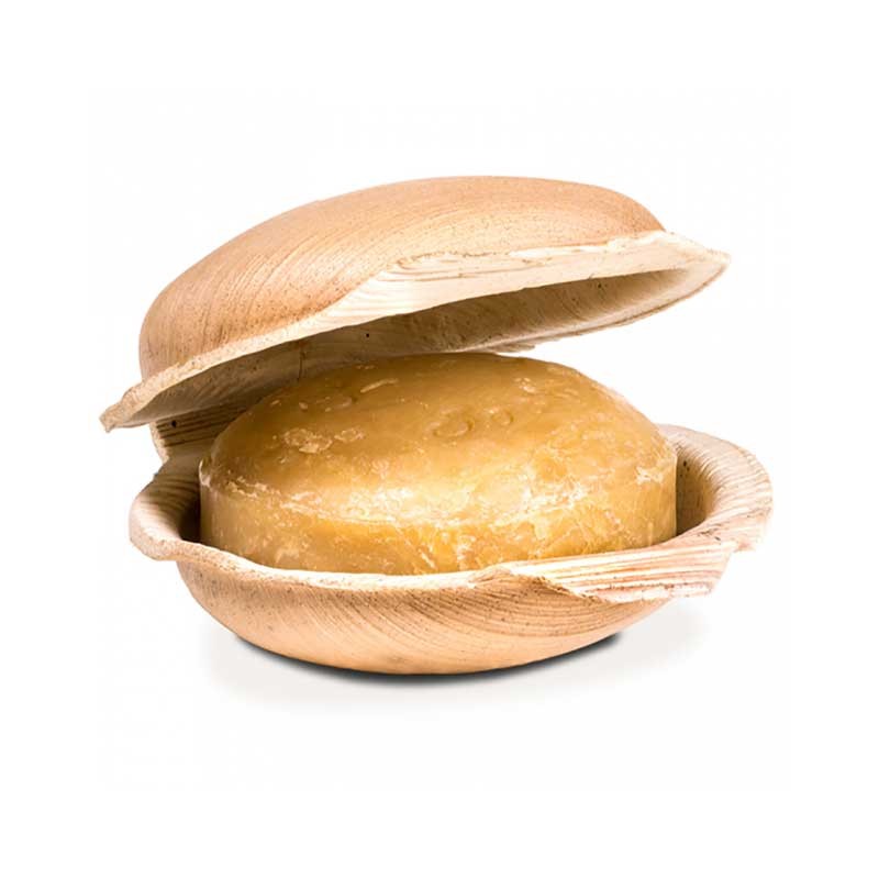 Jabón ayurvédico artesanal "Cúrcuma" con aceite de coco. Purificante, reduce manchas y cicatrices para un aspecto uniforme. Vegano, sin plásticos, comercio justo. Fragancia intensa.