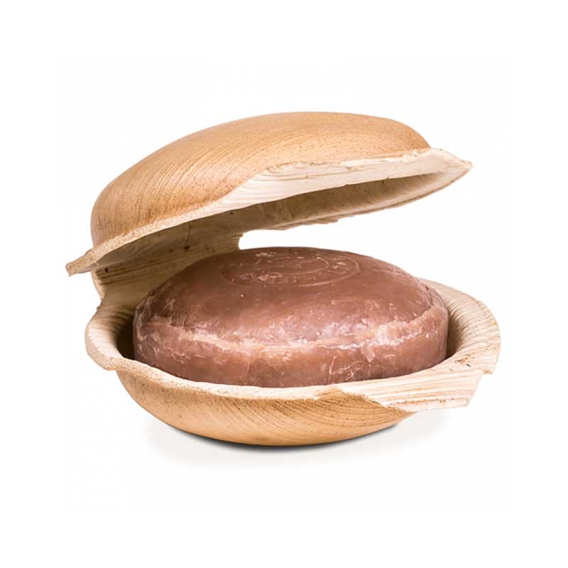 Jabón ayurvédico artesanal "Kewra" con aceite de coco y aceites esenciales. Aroma floral revitalizante para pieles sensibles. Vegano, sin plásticos, comercio justo. Presentado en concha natural.